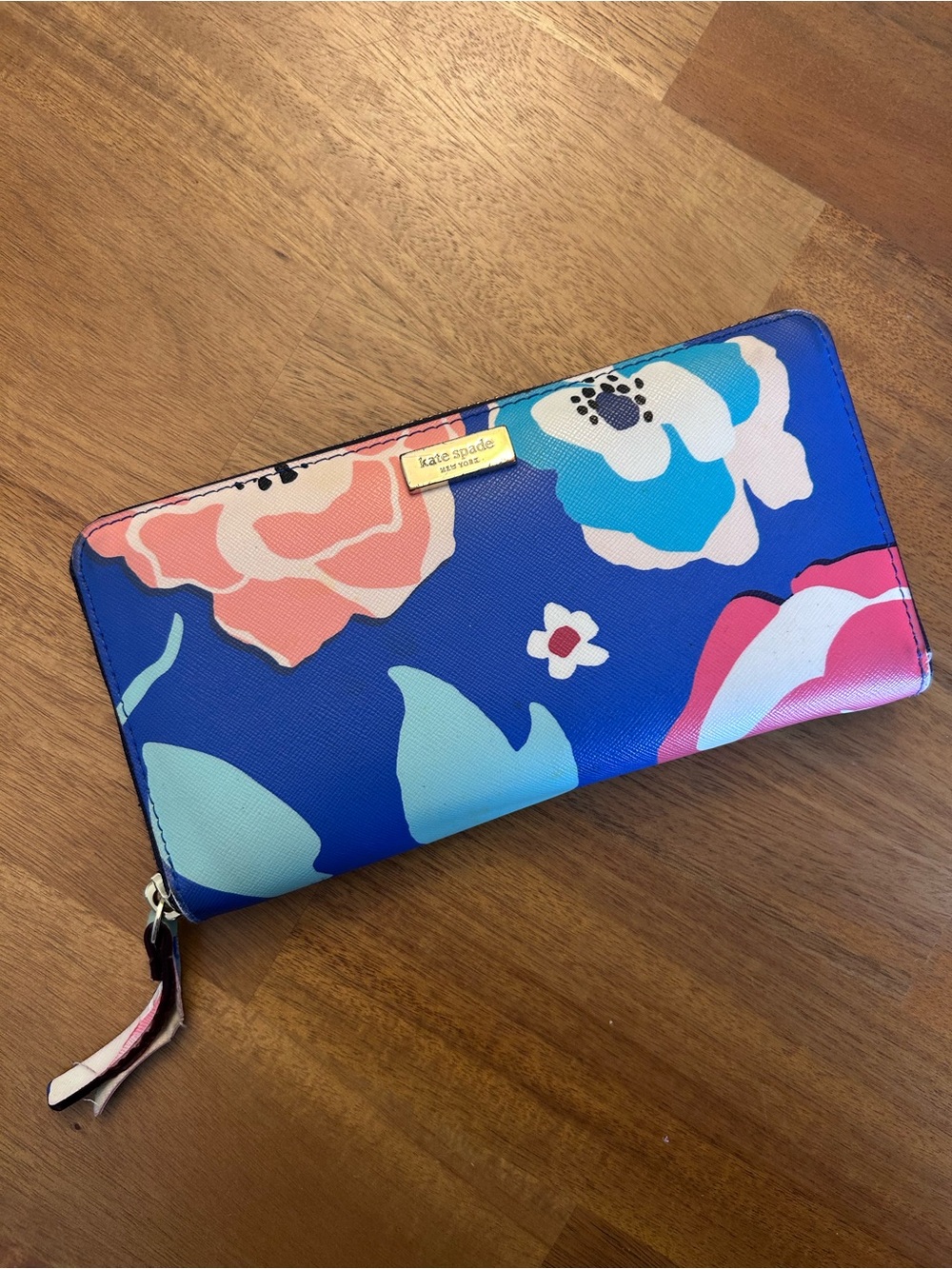 kate spade blue floral zip-around wallet with multicolor blooms